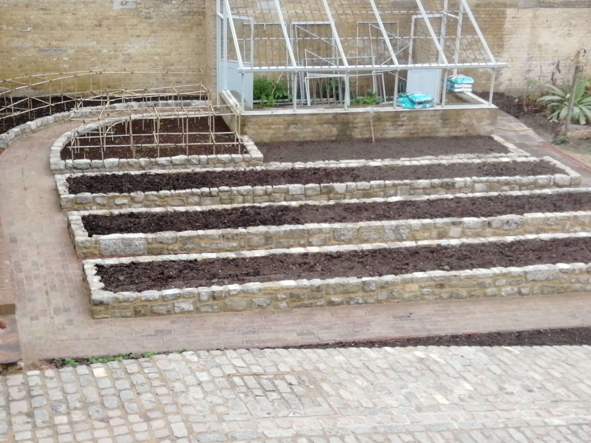 Raised Ragstone Planters Restoration House - Kings Masons